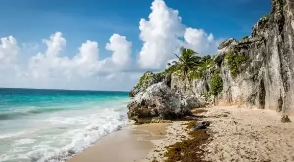 caribbean-sea-and-rocks-mayan-ruins-of-tulum in mexico