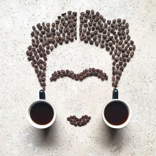 frida-kayla-creative-coffee-bean-art-on-stone-tabl