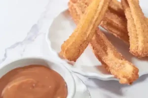 mexican-churros-recipe-served-on-a-homemade-plate