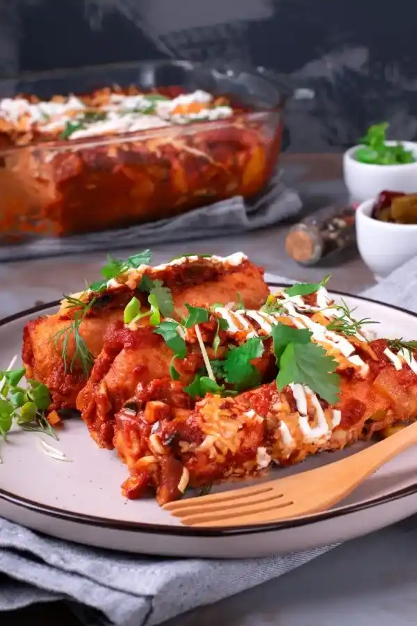 enchiladas-with-crepes-chicken-meat-tomato-sauce